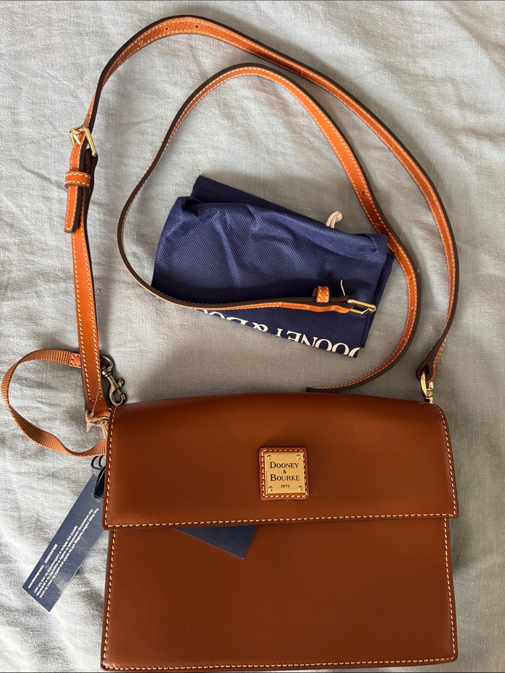 Dooney & Bourke Cognac Brown Leather Crossbody with Gold Plaque